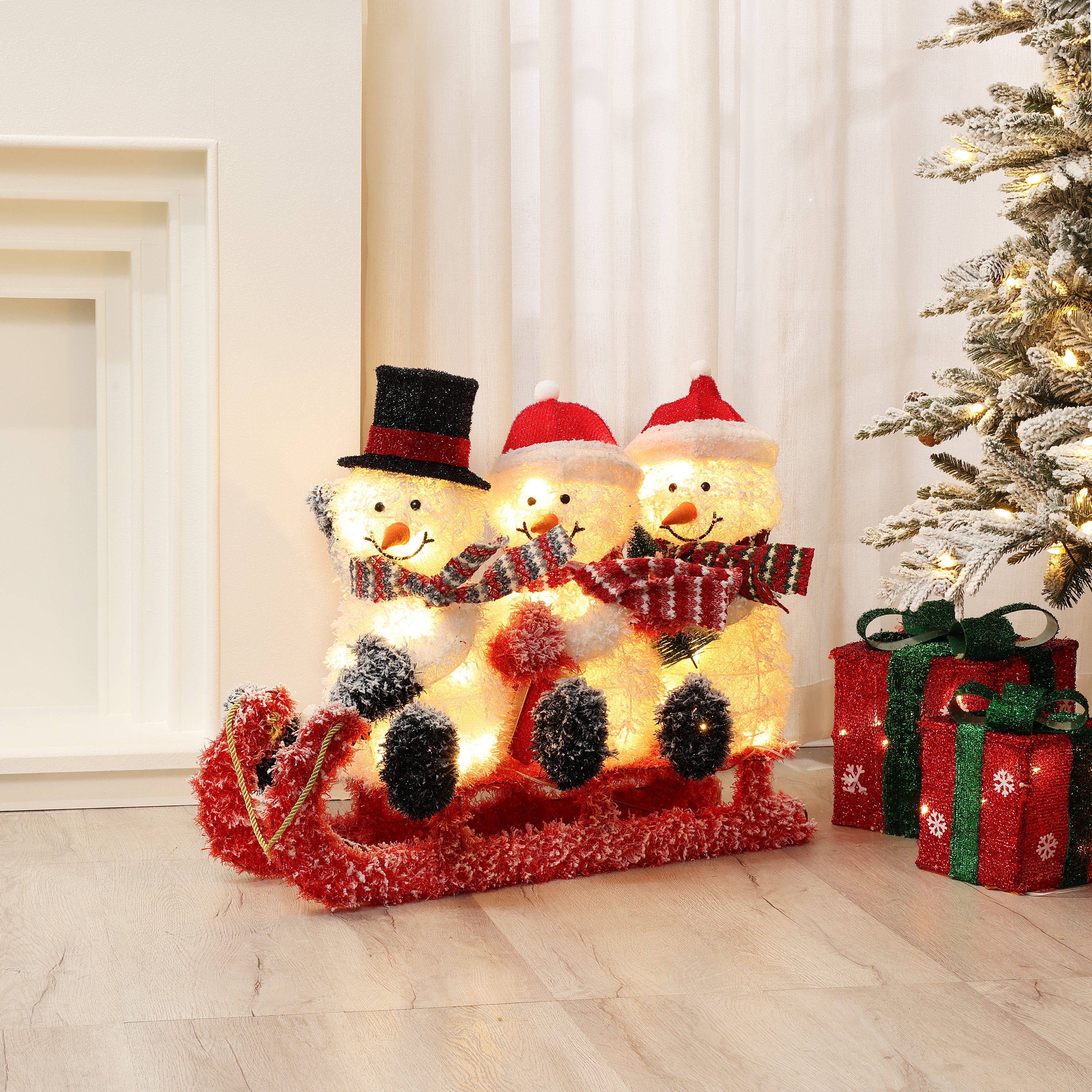 Snowman Family Trio on Sled with Lights Outdoor Holiday Decoration