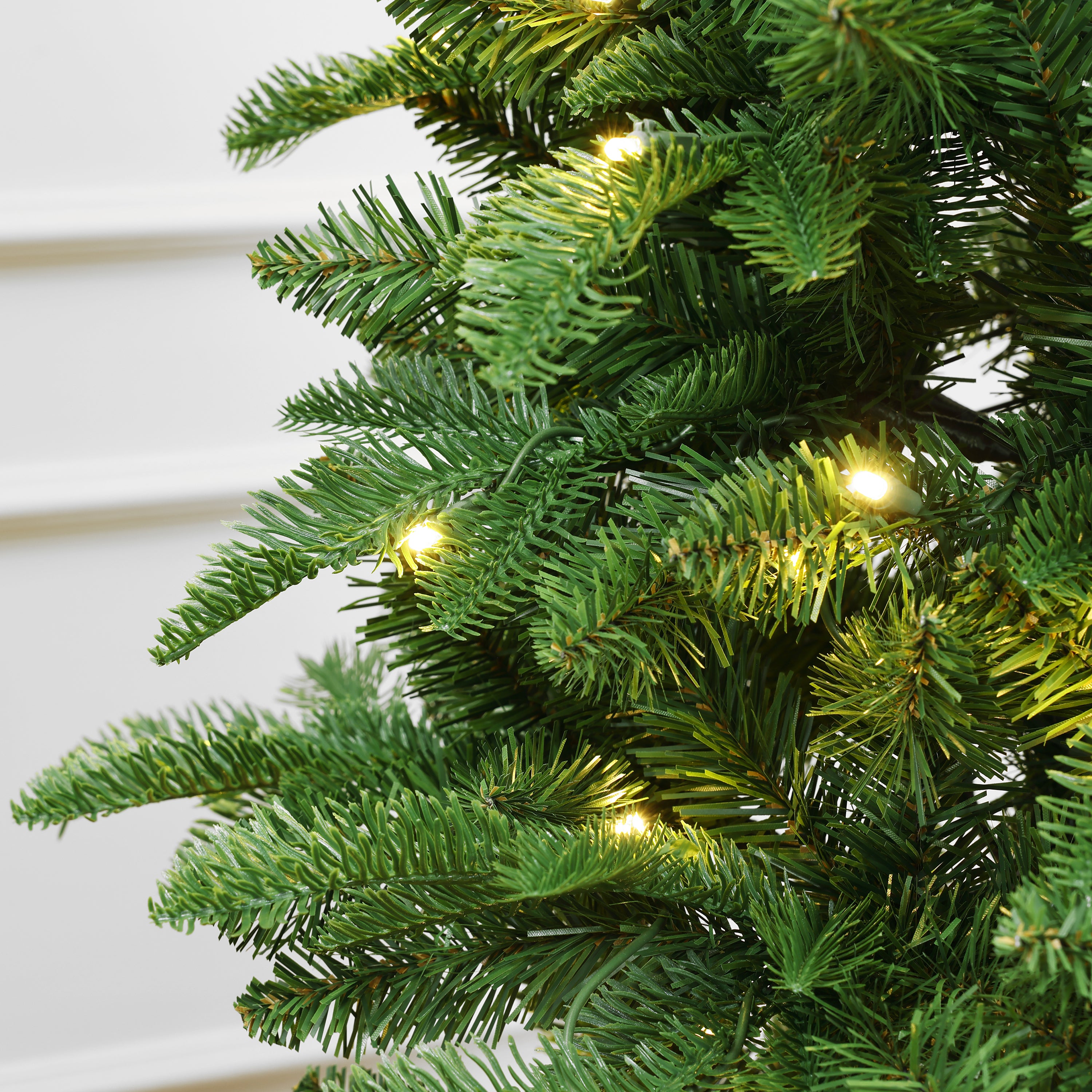 Pre-Lit Artificial Christmas Tree with Warm LED Lights – Dense Green Pine Needles, Black Pot, Easy Setup